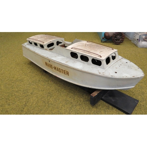 1053 - Large vintage wooden motorised boat with a stand. 34