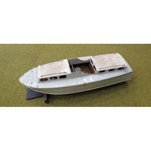 1053 - Large vintage wooden motorised boat with a stand. 34