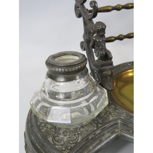 800 - Vintage desk tidy inkwell stand decorated with cherubs and a large glass inkwell.