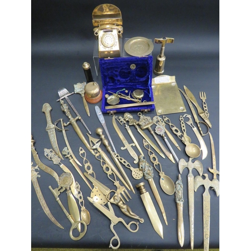 805 - Large selection of Brass Letter openers, Candle snuffer, Bottle openers etc. see photos