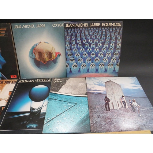 825 - Ten Vinyl Rock & Pop LP's by Hendrix, Jarre , Van Gellis, Gabriel, Kraftwerk. See photos.