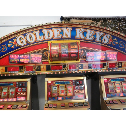 970 - Bank of Three electric Gaming Machines, all in working order.  Each works indivdually or part of a T... 