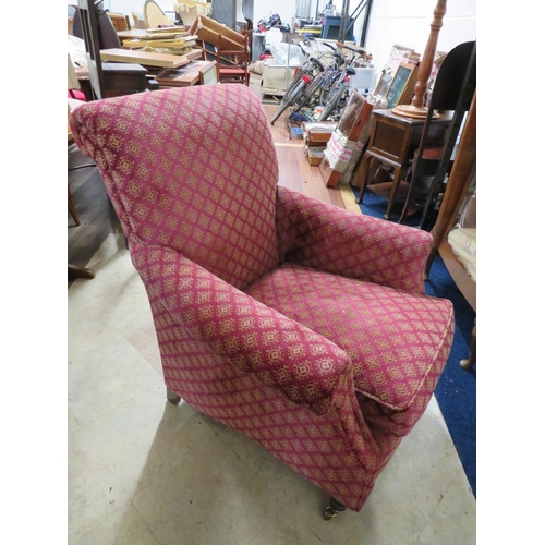 997 - Nicely Upholsered Club chair with castors to front legs. Good condition.(Barn) See photos. S2