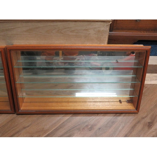 1017 - Two joiner made, Wall mounted Glass fronted display cabinets with hinged front, Magnetic catch and i... 