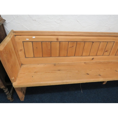 953 - Long and well constucted pine pew with fitted plate rack to rear. H:33 x W:107 x D:20 Inches. See ph... 