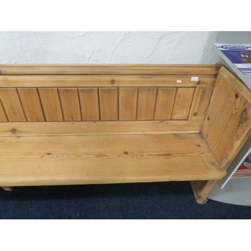 953 - Long and well constucted pine pew with fitted plate rack to rear. H:33 x W:107 x D:20 Inches. See ph... 