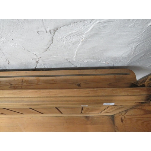 953 - Long and well constucted pine pew with fitted plate rack to rear. H:33 x W:107 x D:20 Inches. See ph... 