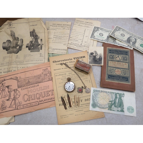 575A - Collectables lot to include a running enamel faced pocket watch, sterling silver, bank notes, and ep... 