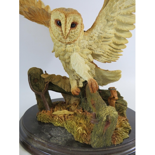 22 - 2 Brooks and Bentley owl figurines on wooden bases, the tallest is approx 14.5