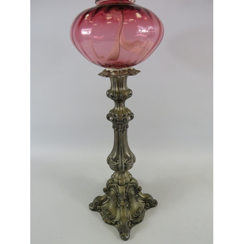 39 - Very tall cranberry glass oil lamp approx 31