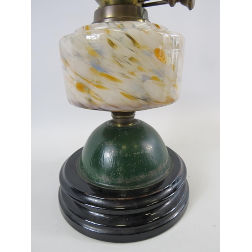 40 - British made vintage oil lamp with a ceramic and metal base. Approx 25