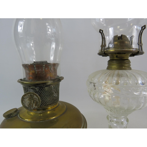 42 - 1 brass and 1 glass vintage oil lamps.