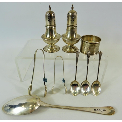 107 - Selection of Hallmarked Silver items to include a large heavy George III Table spoon, Pair of Cruets... 