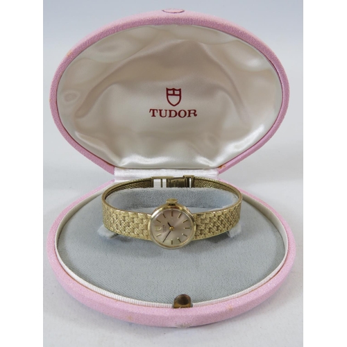 119 - Ladies Swiss made Tudor watch with 9ct Yellow Gold Case and Strap. All Hallmarked 375 gold. Running ... 