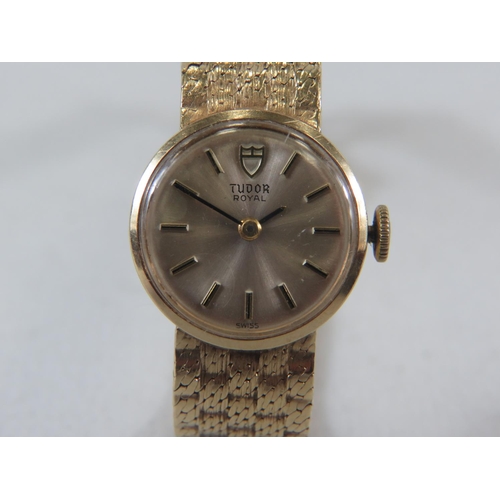 119 - Ladies Swiss made Tudor watch with 9ct Yellow Gold Case and Strap. All Hallmarked 375 gold. Running ... 