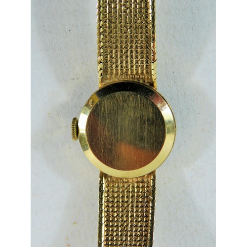 119 - Ladies Swiss made Tudor watch with 9ct Yellow Gold Case and Strap. All Hallmarked 375 gold. Running ... 