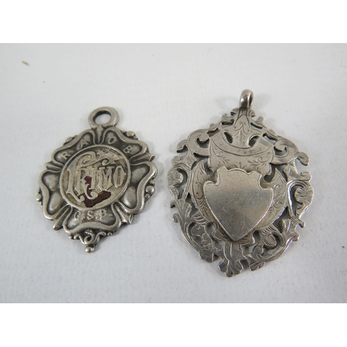 115 - 2 Sterling silver fobs.