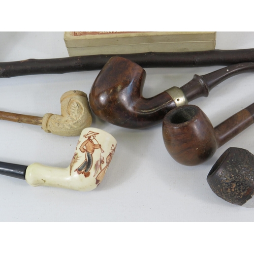 157 - Various vintage pipes and a cigarette box.