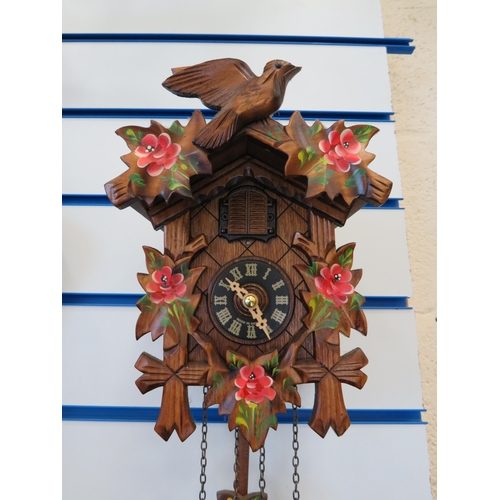 289 - German carved wooden cuckoo clock.