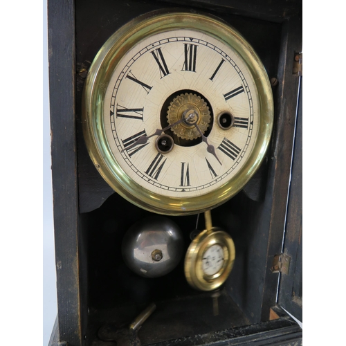 296 - Vintage mantle clock with glass door in running order. Approx 10