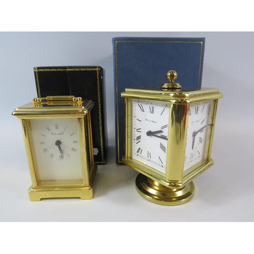 297 - Fox and simpson brass 4 faced carriage clock and a Churchill brass carriage clock. Both come with bo... 