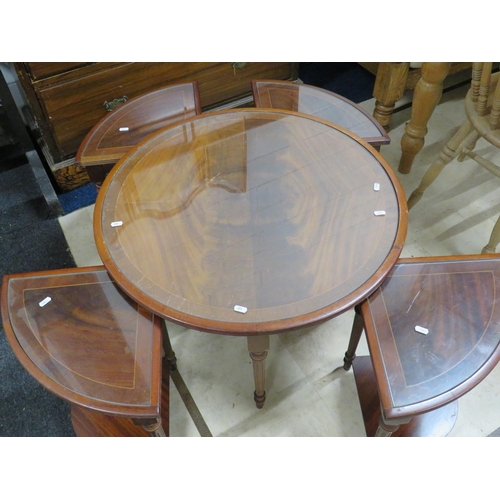 626 - Handy, Darkwood glass topped circular low table with four segmented sub tables all with glass tops. ... 