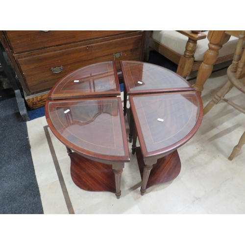 626 - Handy, Darkwood glass topped circular low table with four segmented sub tables all with glass tops. ... 