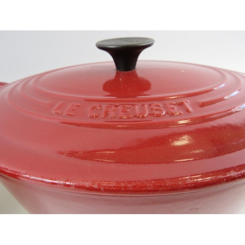 318 - 2 Large lidded Le Creuset casserole pans.