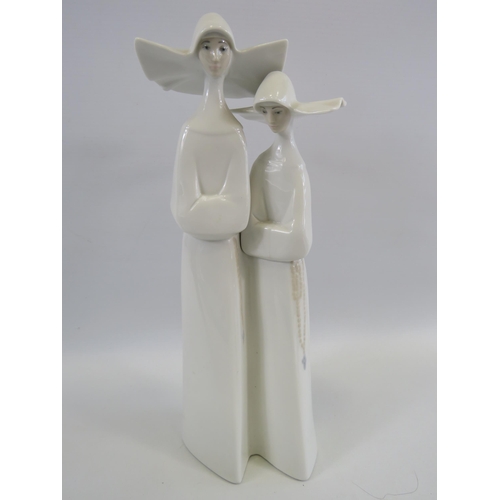 324 - Large Lladro figurine of 2 nuns. 13