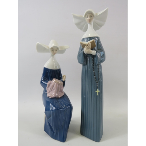 325 - 2 Lladro nun figurines. The tallest measures 10