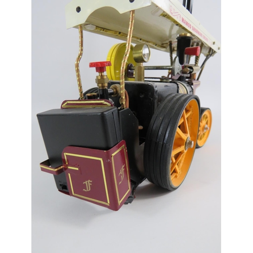 53 - Mamod Showman's Engine (13 x 8 inches) with remote control together with Transport Trailer (19 x 5 i... 