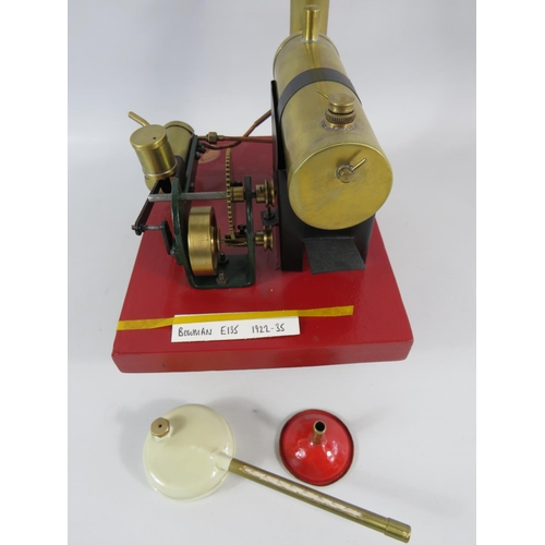 54 - 1922-1935 Bowmans Stationary Steam Engine model E135. Set on a wooden block it measures 7 x 9 inches... 