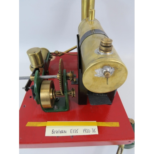 64 - 1922-1935 Bowman E135 Stationary Steam Engine on thick wooden base. 7 x 8 inches. See photos for con... 