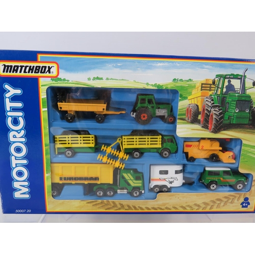 105 - Matchbox Motor City Farm Set, Boxed and unused plus Four 'My First Matchbox' Models,  all boxed and ... 