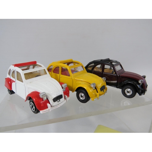 137 - Two UK made Corgi 10/12 Cwt Bedford Vans together with Two UK made and one Chinese made Corgi models... 