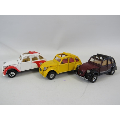 137 - Two UK made Corgi 10/12 Cwt Bedford Vans together with Two UK made and one Chinese made Corgi models... 