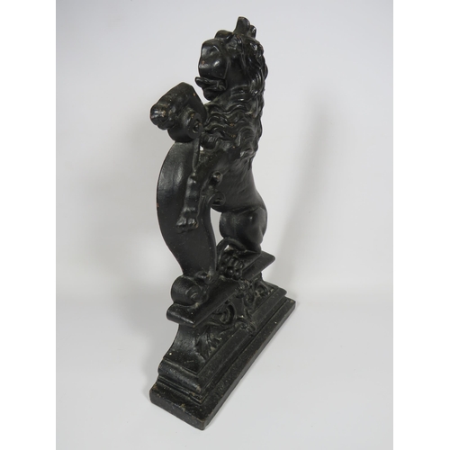 244 - Rampant Lion cast iron door stop which measures 15