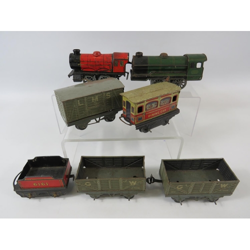 153 - Selection of vintage Hornby 'O' gauge Railway models to include track, Two Clockwork Engines and car... 