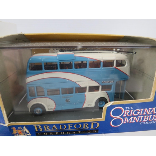 154 - Three Corgi Die Cast bus models, boxed and unused Plus one other by the Omnibus Company. See photos.