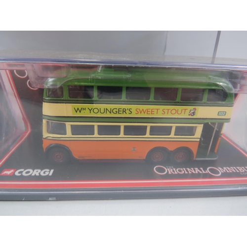 154 - Three Corgi Die Cast bus models, boxed and unused Plus one other by the Omnibus Company. See photos.