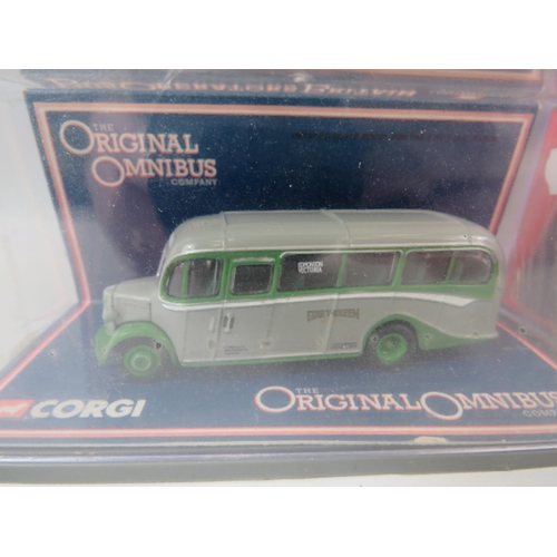 154 - Three Corgi Die Cast bus models, boxed and unused Plus one other by the Omnibus Company. See photos.