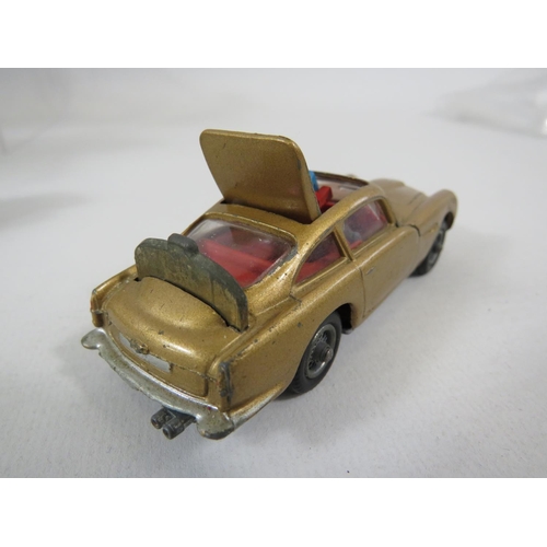 158 - Selection of playworn Corgi and Dinky models. See photos.