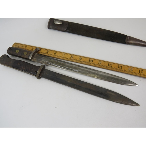 165 - Two Vintage Bayonets, one with scabbard.  Both in worn condition . See photos.