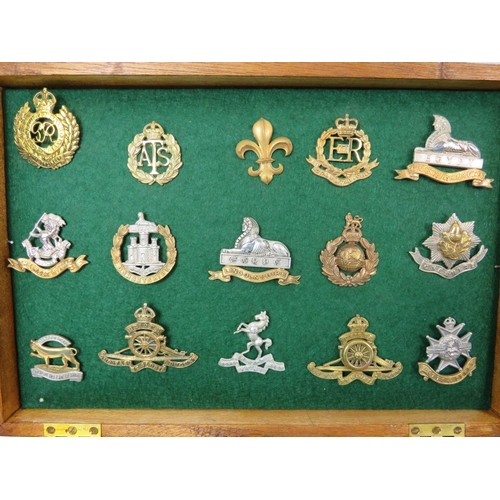 171 - Two Hardwood lined boxes containing  cap badges from British Army Regiments. Each box measures 14 x ... 