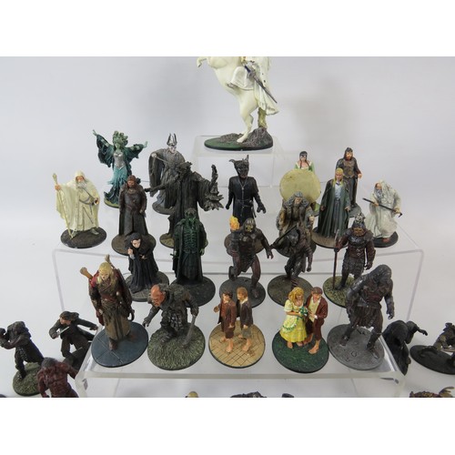 163 - Large selection of Lead cast Lord of the Rings figures plus printed information material.  See photo... 