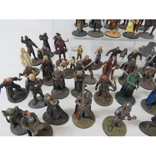 163 - Large selection of Lead cast Lord of the Rings figures plus printed information material.  See photo... 