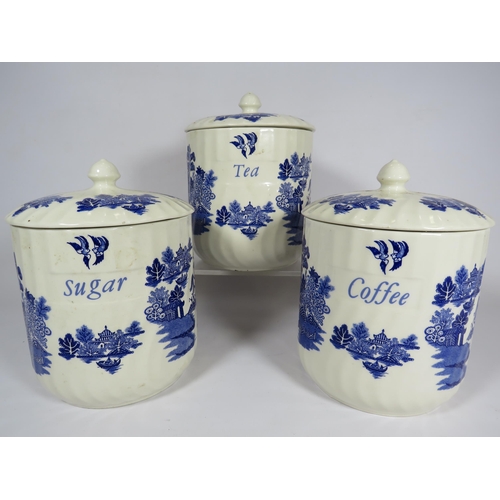 294 - 3 Blue and white willow pattern Tea, coffee and sugar storage jars.