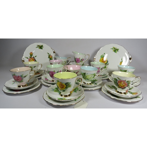 301 - 38 Pieces of Roslyn china World Famous Roses teaset.