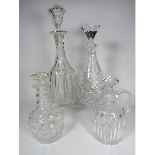 315 - 4 Good quality heavy crystal glass decanters.