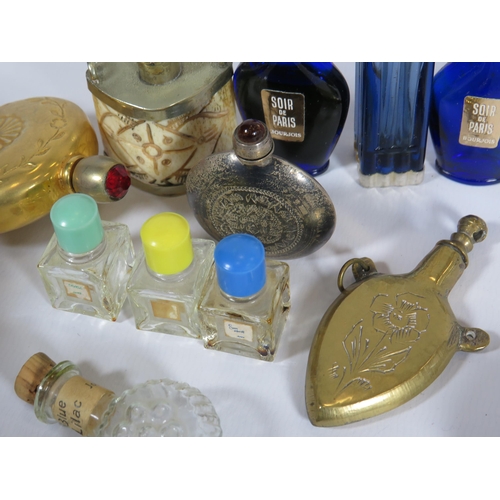 324 - Selection of small vintage scent bottles some with sterling silver tops.